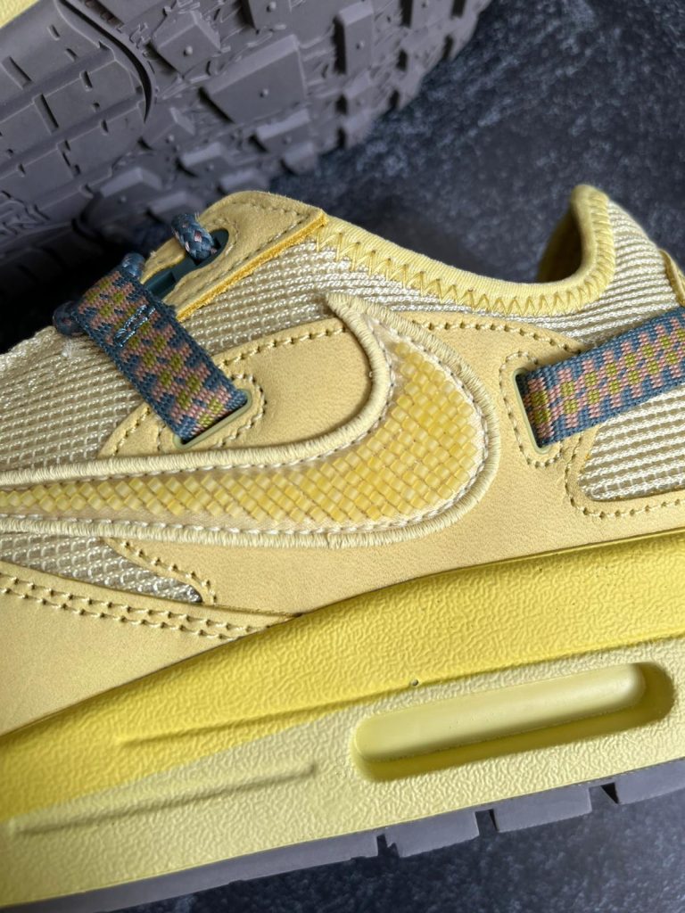 Travis Scott x Nike Air Max 1 Saturn Gold side profile close up