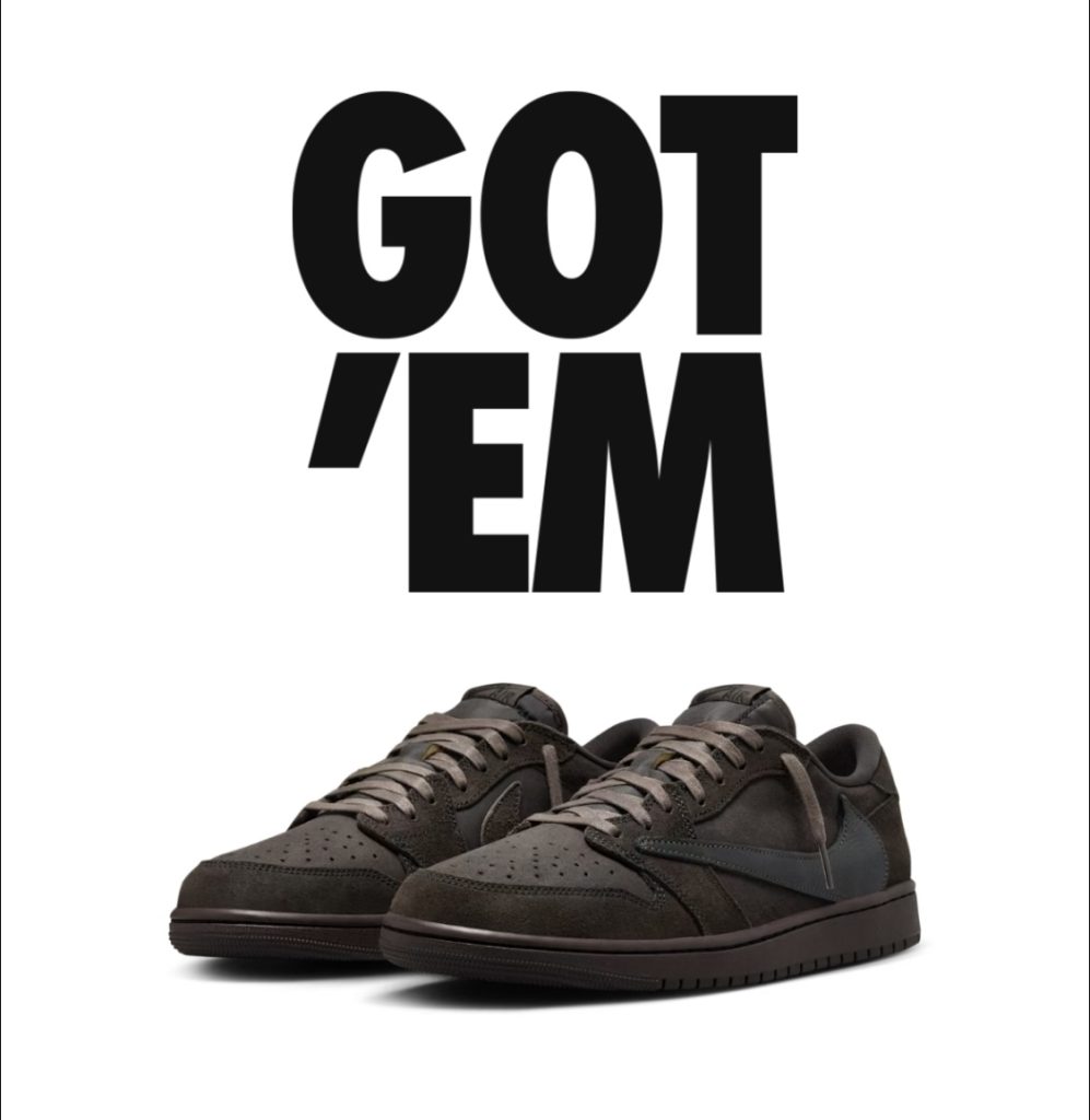Jordan 1 Low Travis Scott Velvet Brown with “GOT ’EM” graphic above sneaker in tonal brown suede